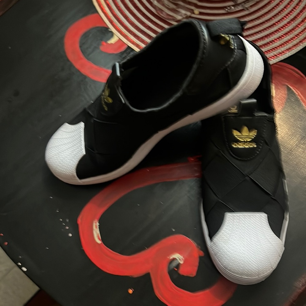 Black adidas slip one size 10